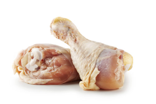 Two raw chicken legs